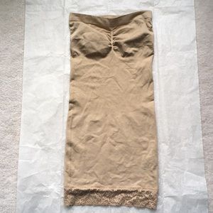 Strapless tan colored body shaper.  NWOT.